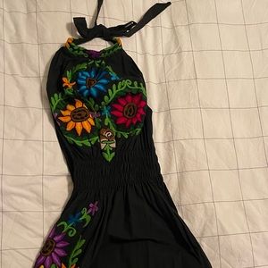 Backless, handmade, embroidered dress from Mexico.